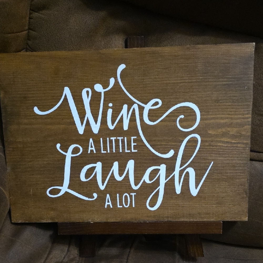 Brown Wooden Sign with White Text